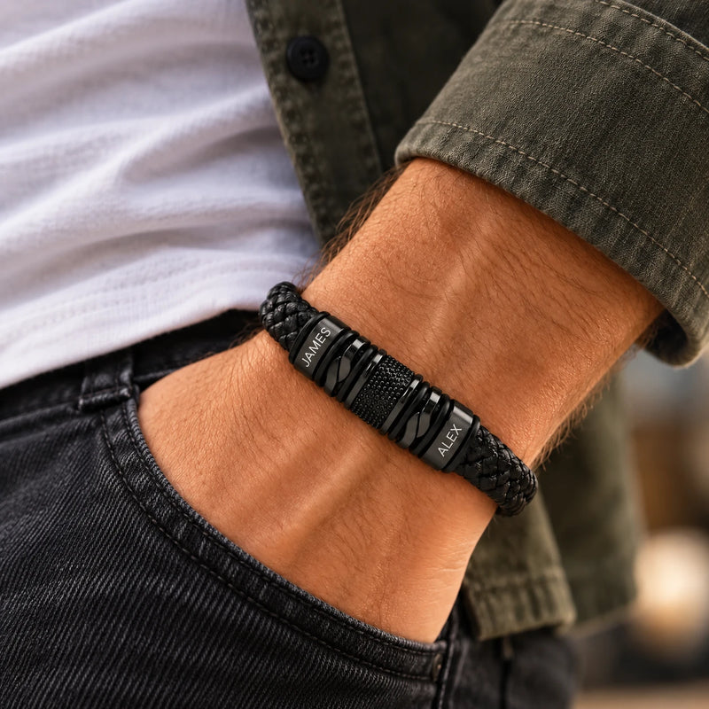 Engraved leather bracelet worn with the hand in a pocket