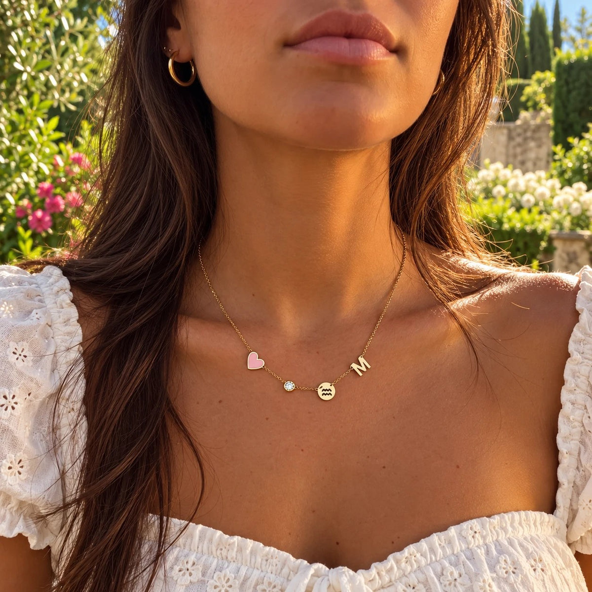 Gold personalised necklace worn in a garden